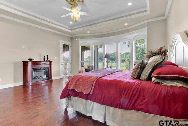 a view of a swimming pool with outdoor seating