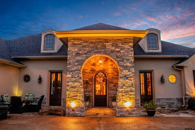 a view of swimming pool with a garden