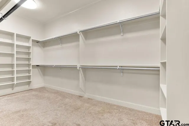 a front view of house with outdoor space and garden