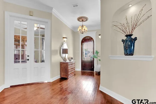 a view of an empty room with cabinet