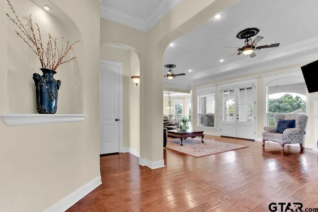 a living room with furniture and a rug