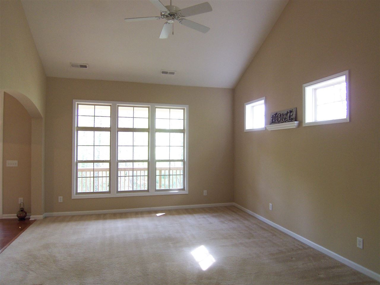 6157 Blakeman Lane Raleigh, NC 27617 - Photo 6 of 25 Large room with vaulted ceilings overlooking the private backyard! Family room