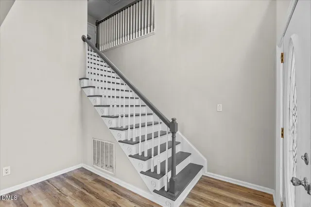 a view of entryway with wooden floor