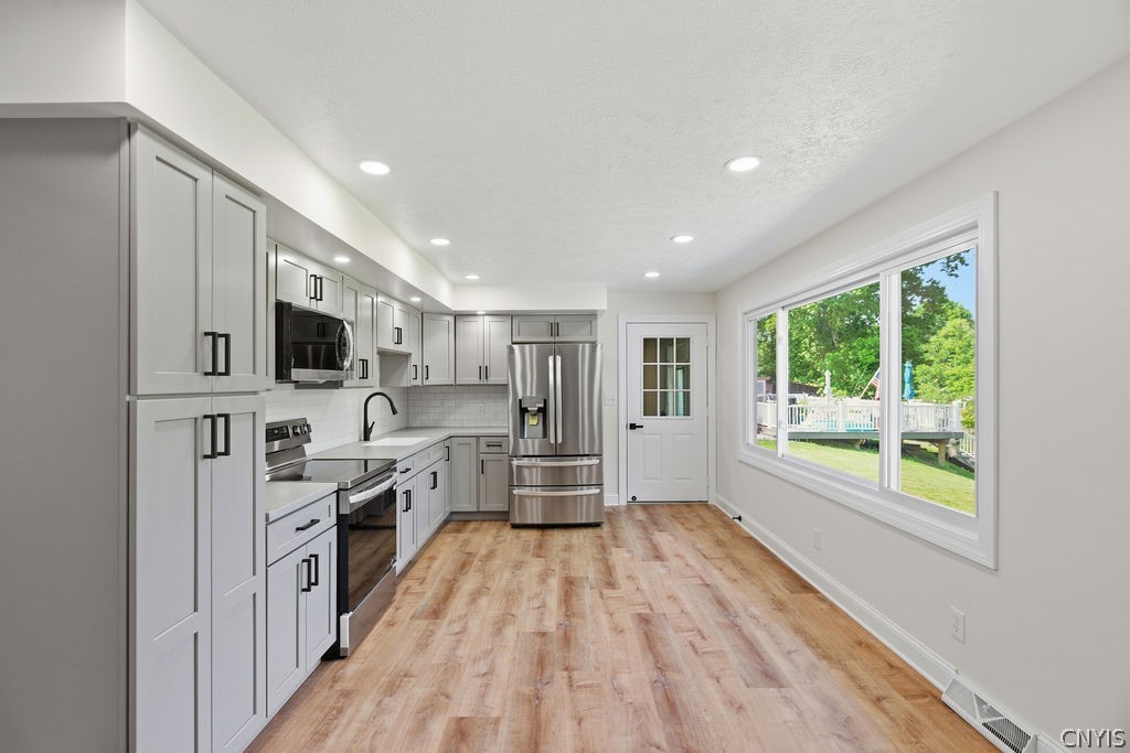 7016 Guyder Road Lysander, NY 13112 - Photo 4 of 41 modern new kitchen, brand new everything!
