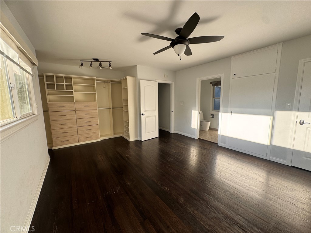 2248 East Chevy Chase Drive Glendale, CA 91206 - Photo 17 of 25 a view of empty room with wooden floor and fan