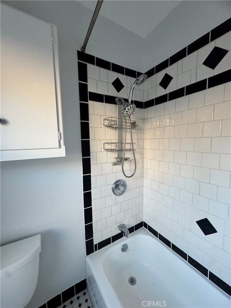 2248 East Chevy Chase Drive Glendale, CA 91206 - Photo 23 of 25 a bathroom with a shower and a sink