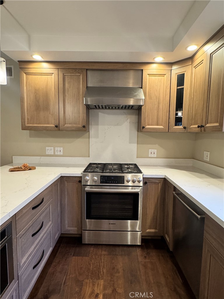 2248 East Chevy Chase Drive Glendale, CA 91206 - Photo 7 of 25 a kitchen with a stove and a sink