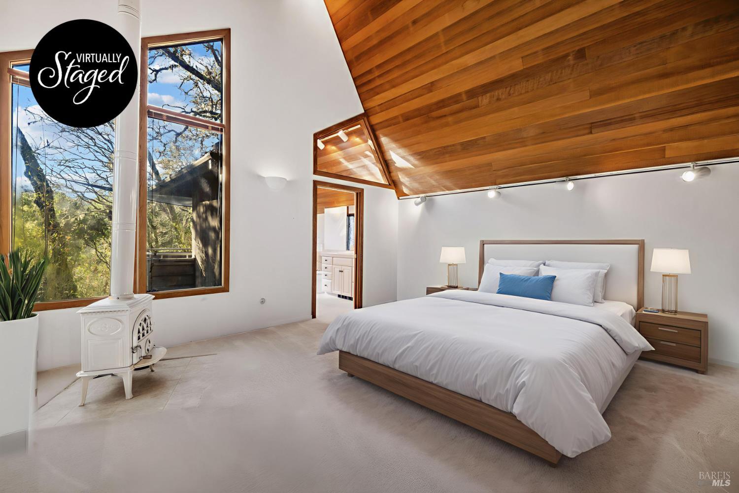 9105 Loch Haven Drive Santa Rosa, CA 95404 - Photo 13 of 62 a bedroom with a bed and a table with mirror