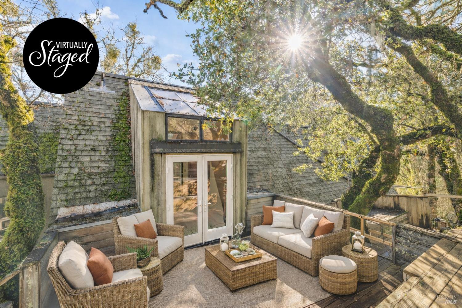 9105 Loch Haven Drive Santa Rosa, CA 95404 - Photo 18 of 62 a view of a patio with couches table and chairs and potted plants