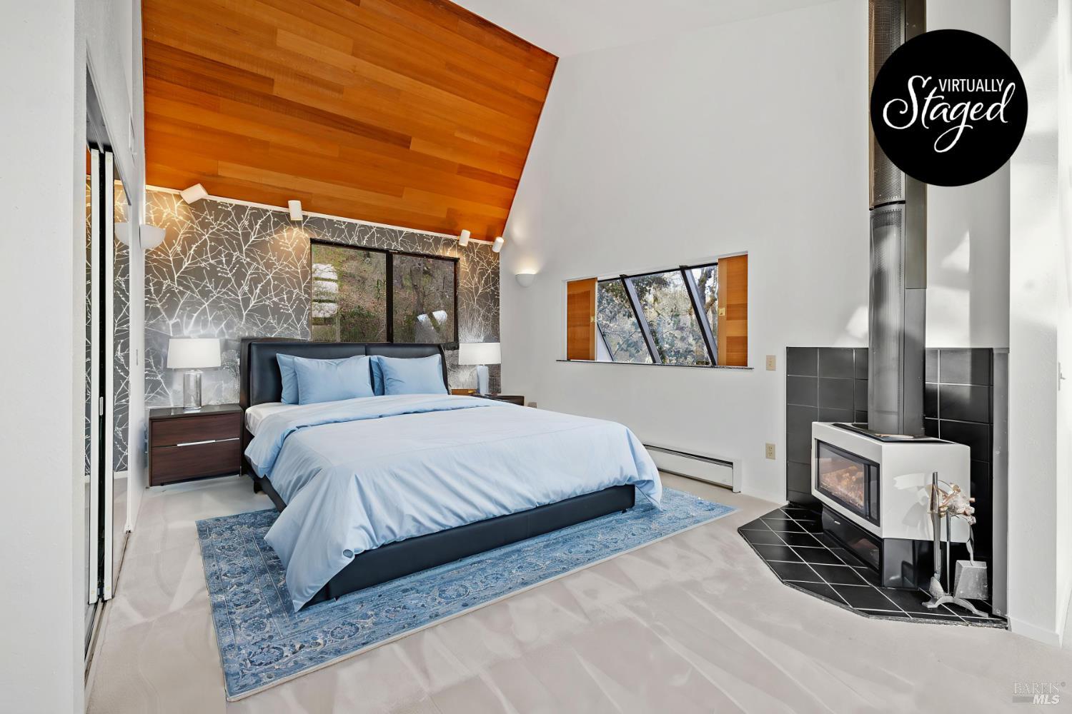 9105 Loch Haven Drive Santa Rosa, CA 95404 - Photo 21 of 62 a bedroom with a bed a mirror on table and a window