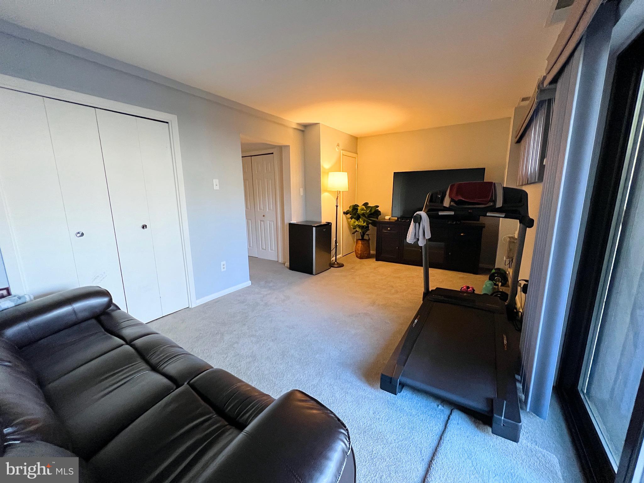 1610 Valencia Way Reston, VA 20190 - Photo 18 of 19 Fully-finished basement family room with walkout