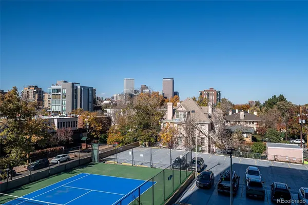 a view of a city with tall buildings