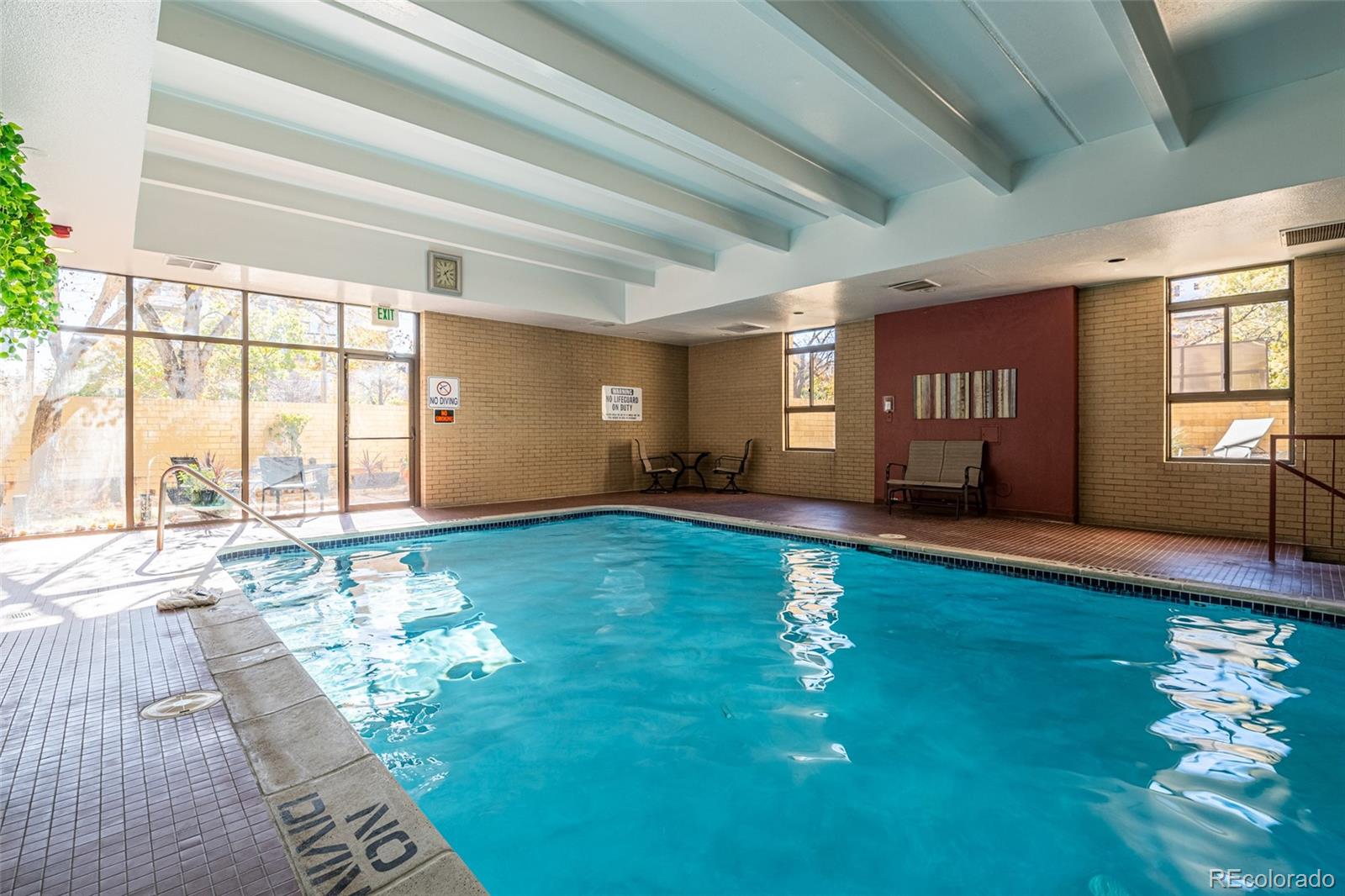 800 North Pearl Street, Unit 403 Denver, CO 80203 - Photo 21 of 36 a living room with hard wood flooring and a couch