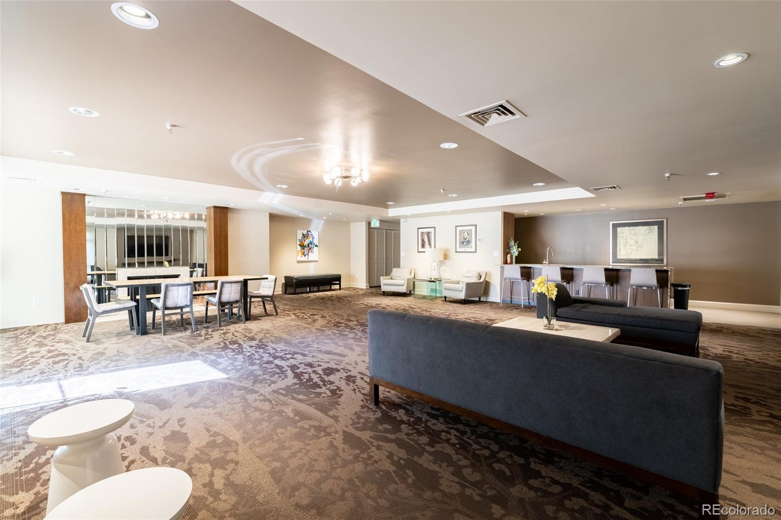 800 North Pearl Street, Unit 403 Denver, CO 80203 - Photo 30 of 36 a living room with furniture and a dining room with kitchen view