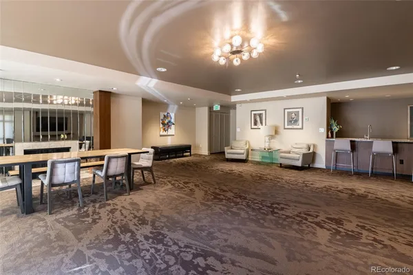 a view of a big room with furniture window and wooden floor