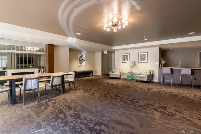 a view of a big room with furniture window and wooden floor