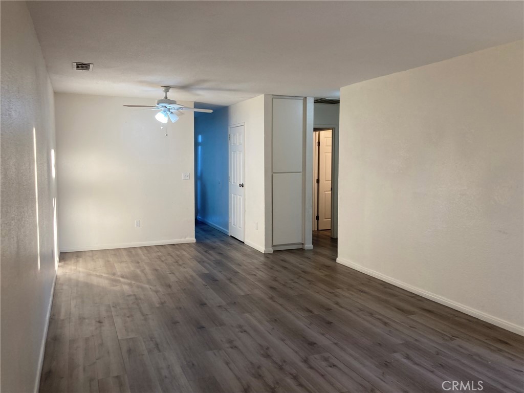 1131 Barstow Road Barstow, CA 92311 - Photo 22 of 36 Unit B - Living room looking from front through to kitchen & hall to bedrooms