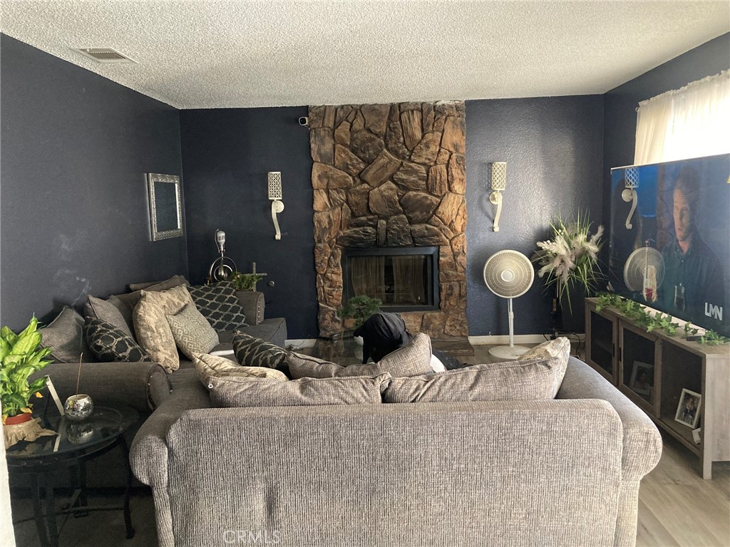 1131 Barstow Road Barstow, CA 92311 - Photo 25 of 36 Unit A - Living room with fire place