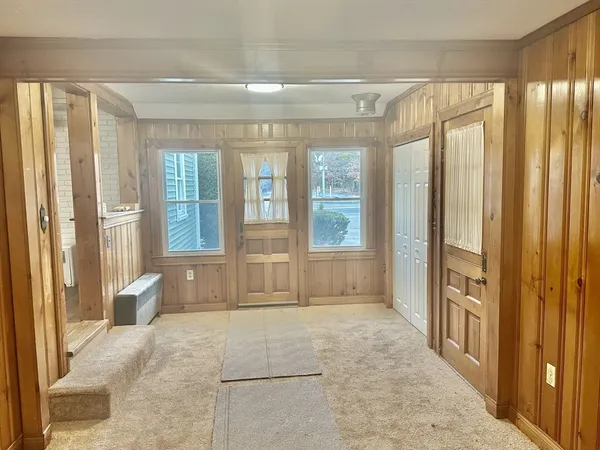 a view of an empty room and window