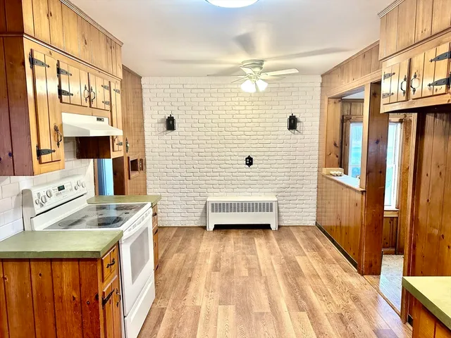 a bathroom with a sink a mirror and a shower