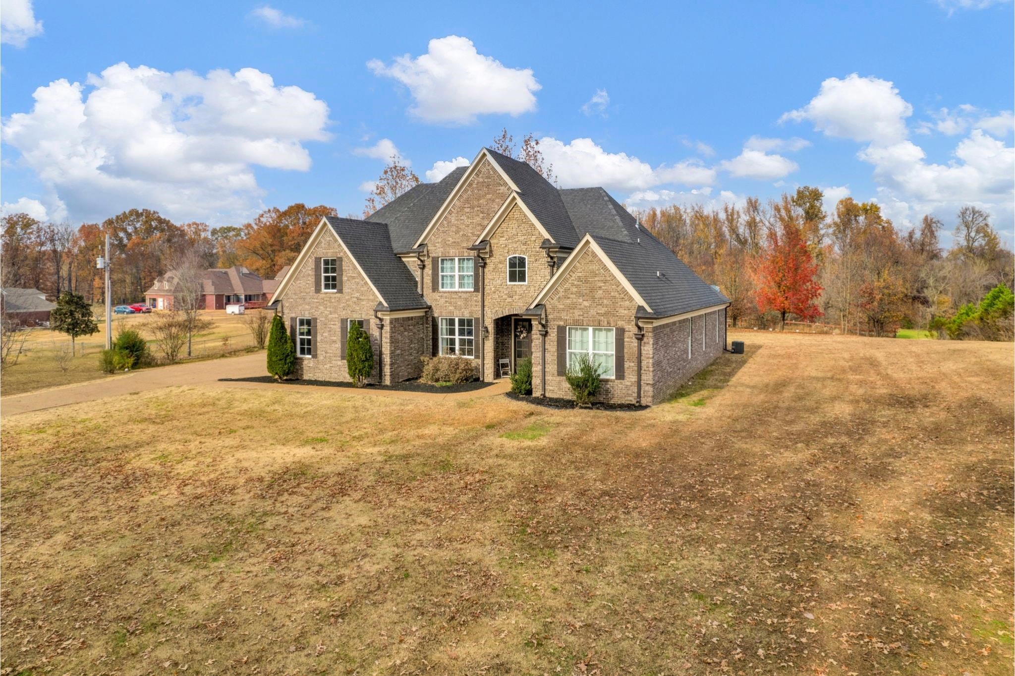 3270 Rast Road Millington, TN 38053 - Photo 2 of 40 Traditional-style home featuring brick siding and a front lawn