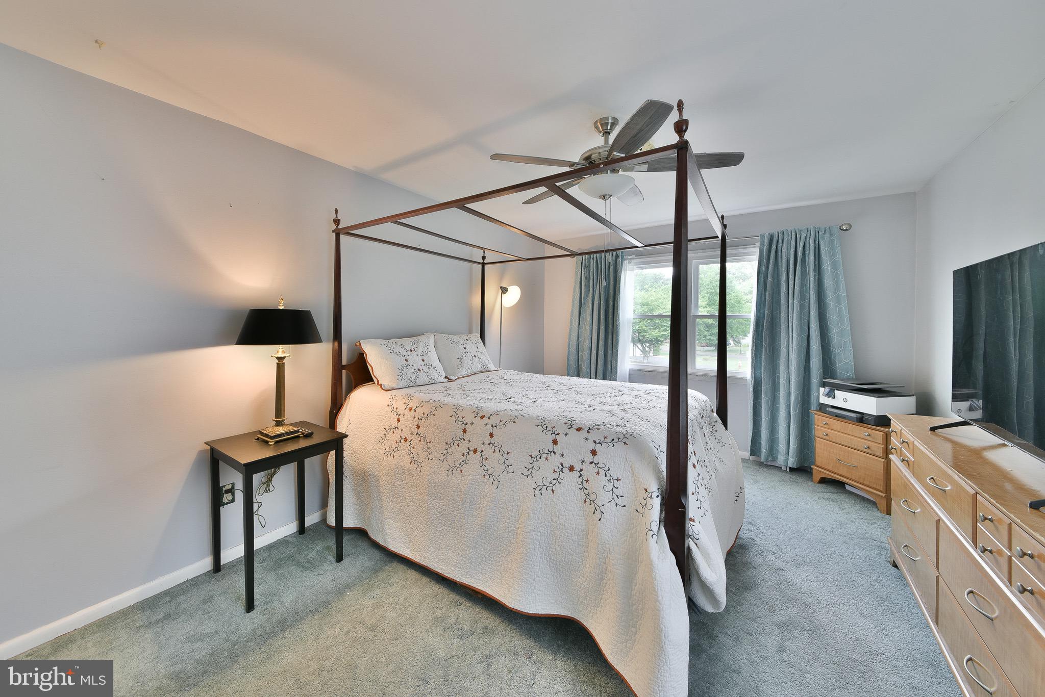 17 Ruhl Drive Perkasie, PA 18944 - Photo 33 of 41 a spacious bedroom with a bed and a flat screen tv