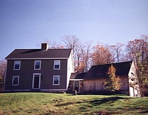 848 Charity Hill Road Hardwick, MA 01037 - Photo 1 of 1 a front view of a house with a garden