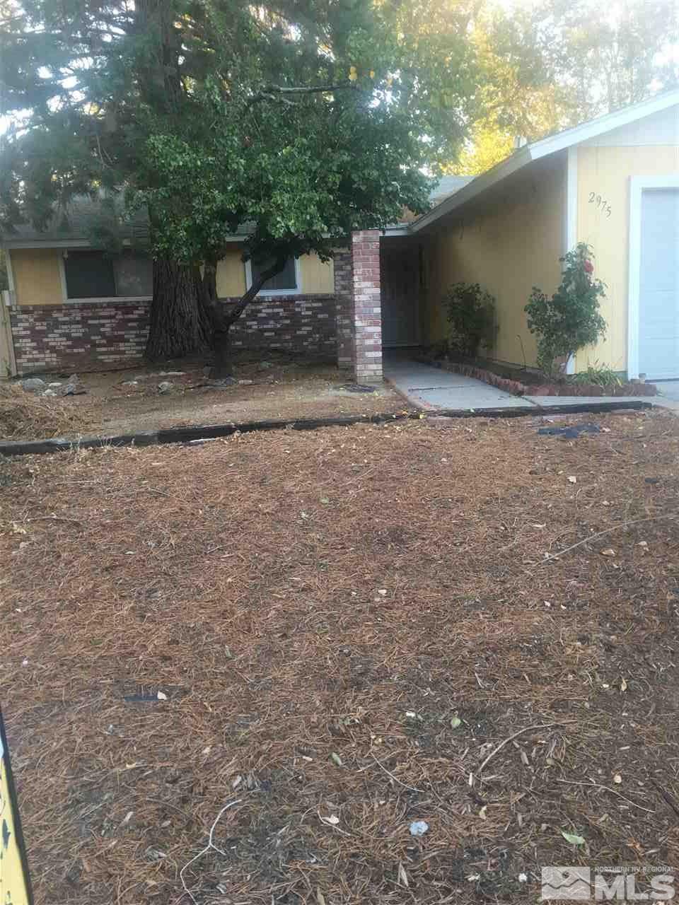 2975 Bobby Drive Reno, NV 89502 - Photo 1 of 1 a view of outdoor space with yard and garage