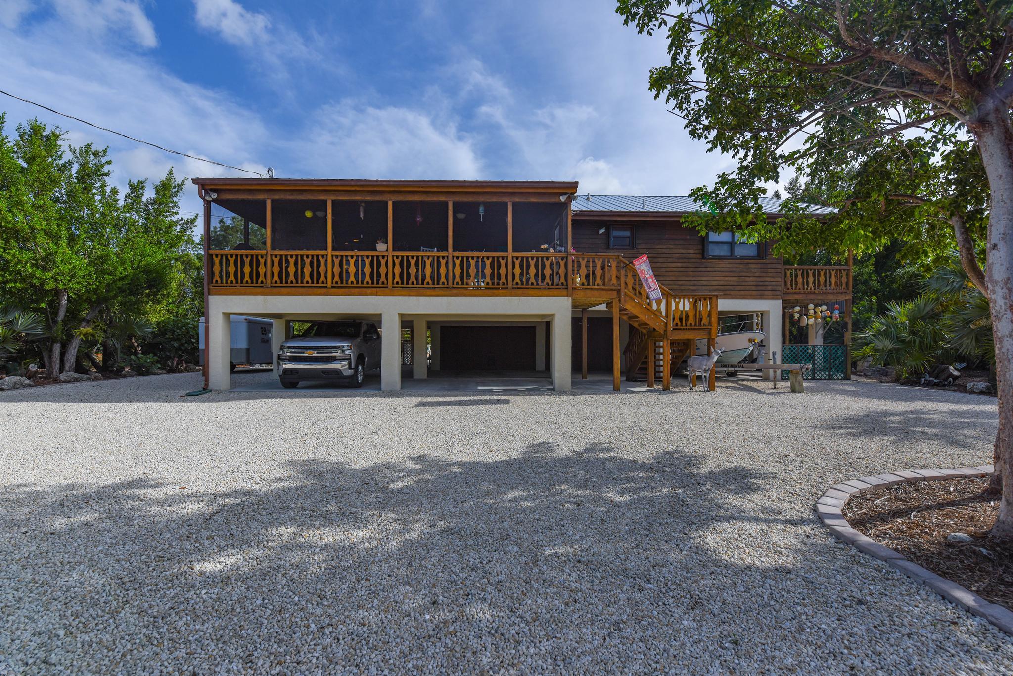 29430 Chickasaw Street Big Pine Key, FL 33043 - Photo 1 of 33 a view of house with outdoor space and parking