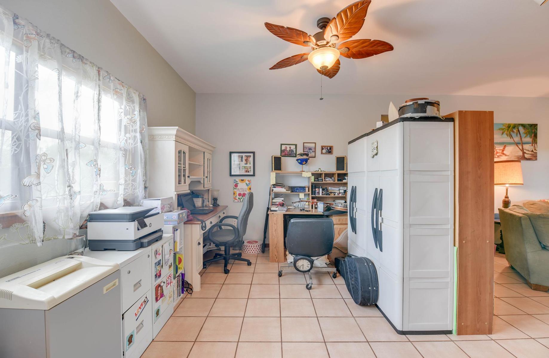 29430 Chickasaw Street Big Pine Key, FL 33043 - Photo 21 of 33 a kitchen with stainless steel appliances a stove a refrigerator and a sink