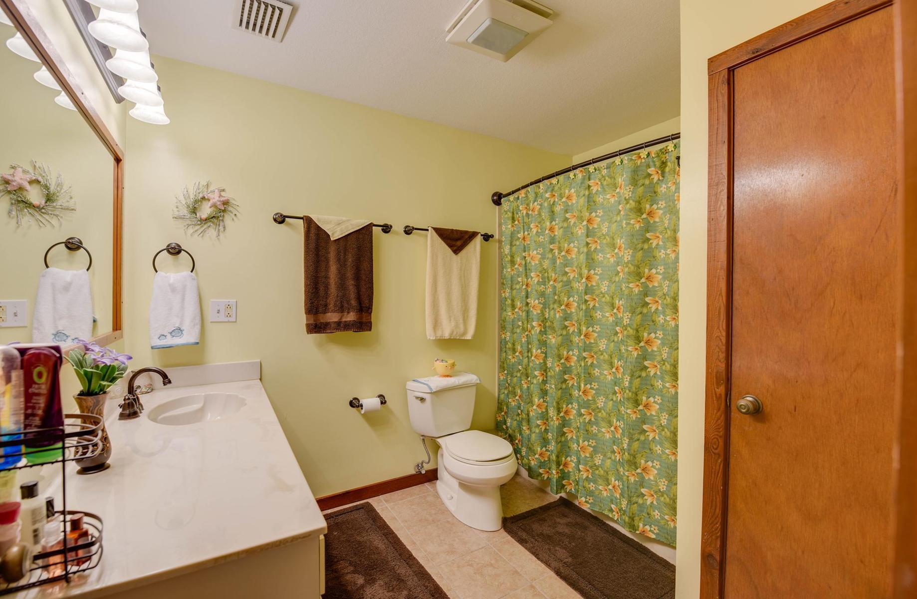 29430 Chickasaw Street Big Pine Key, FL 33043 - Photo 22 of 33 a bathroom with a sink toilet and shower