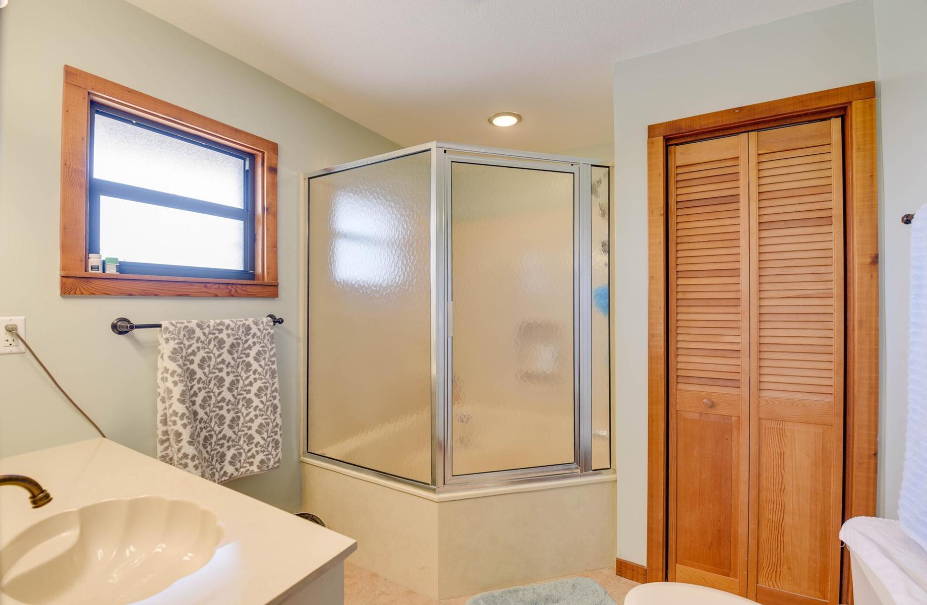 29430 Chickasaw Street Big Pine Key, FL 33043 - Photo 23 of 33 a bathroom with a sink and a mirror