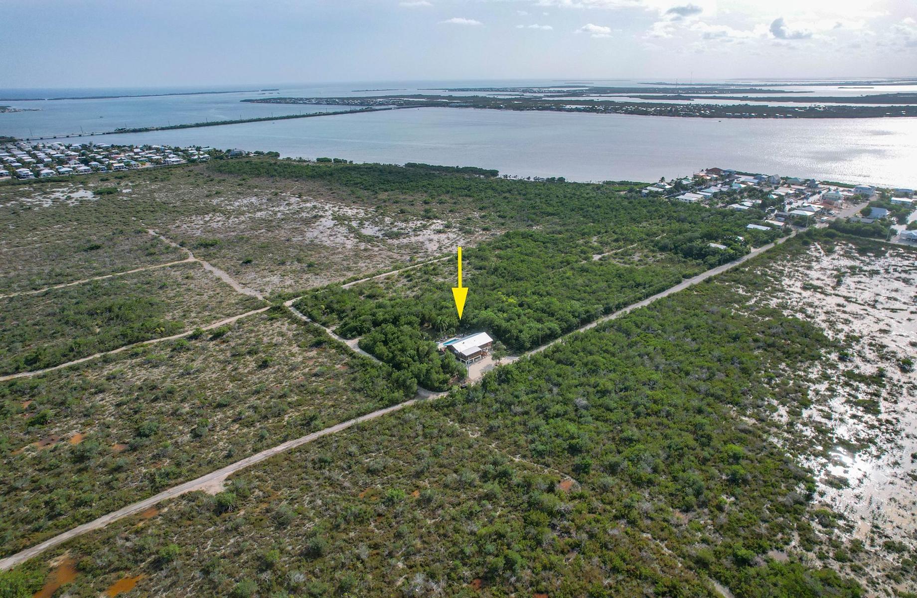 29430 Chickasaw Street Big Pine Key, FL 33043 - Photo 7 of 33 a view of a lake from a balcony