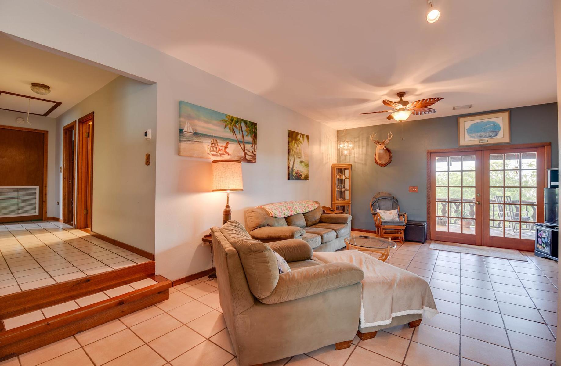 29430 Chickasaw Street Big Pine Key, FL 33043 - Photo 10 of 33 a living room with furniture and a fireplace
