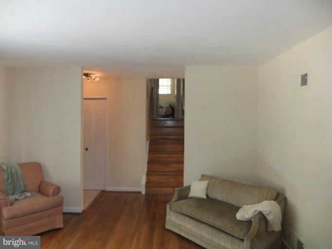 6411 Earlham Drive Bethesda, MD 20817 - Photo 11 of 16 a living room with furniture and wooden floor