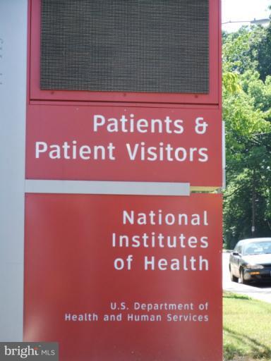 6411 Earlham Drive Bethesda, MD 20817 - Photo 16 of 16 a sign on the wall of a building