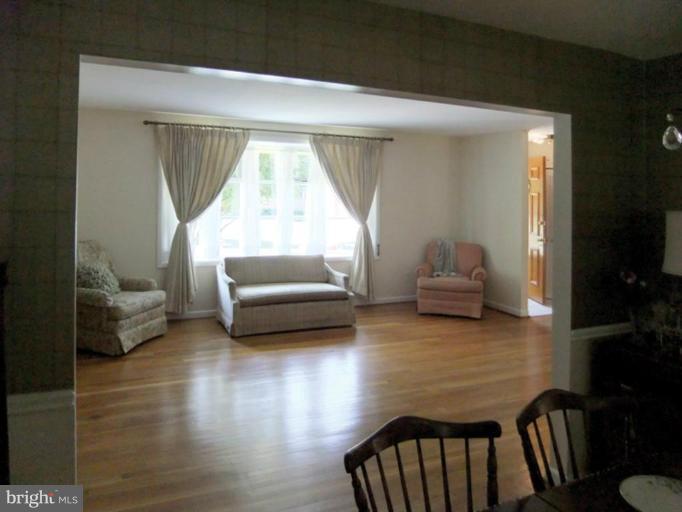 6411 Earlham Drive Bethesda, MD 20817 - Photo 6 of 16 a living room with furniture and a window