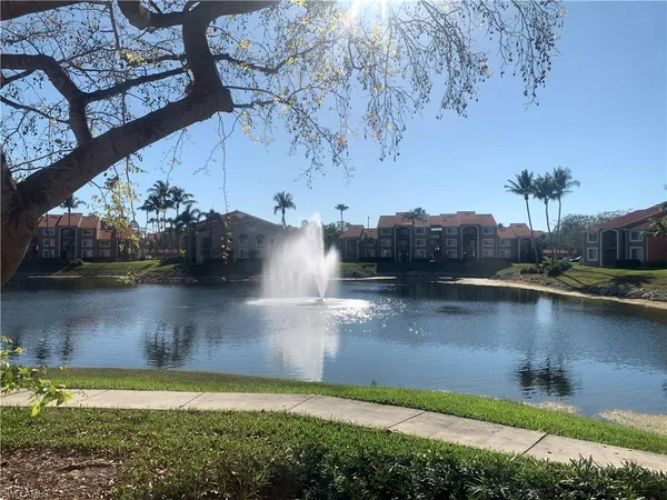 a view of a lake in middle of the house