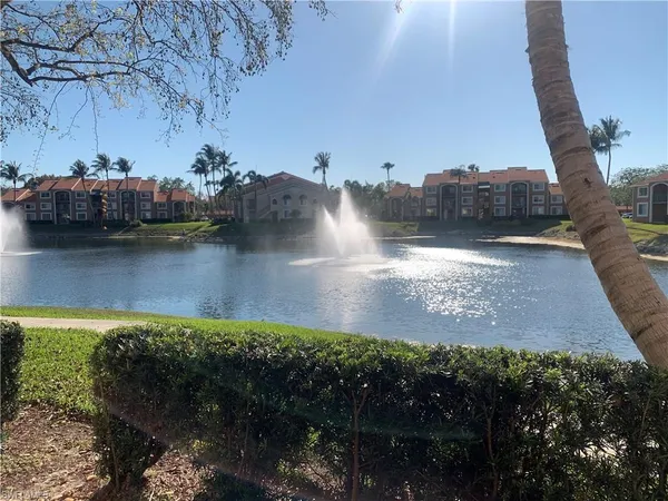 a view of a water pond with an outdoor space