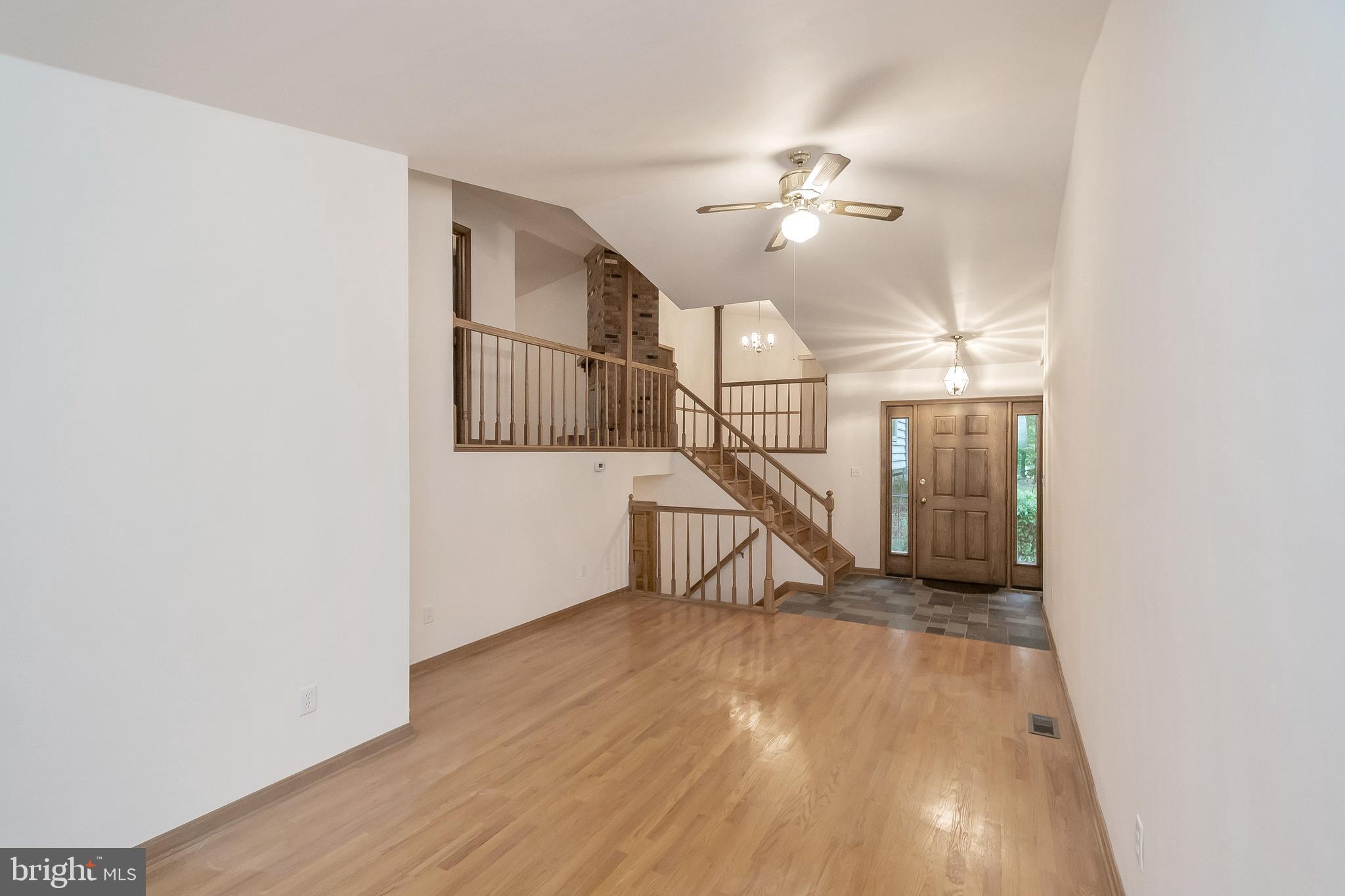 506 Birdie Road Locust Grove, VA 22508 - Photo 6 of 35 Family room to up stairs and down stairs
