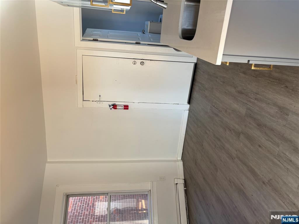 86 Center Street, Unit 3F Clifton, NJ 07011 - Photo 3 of 8 wooden floor in an empty room