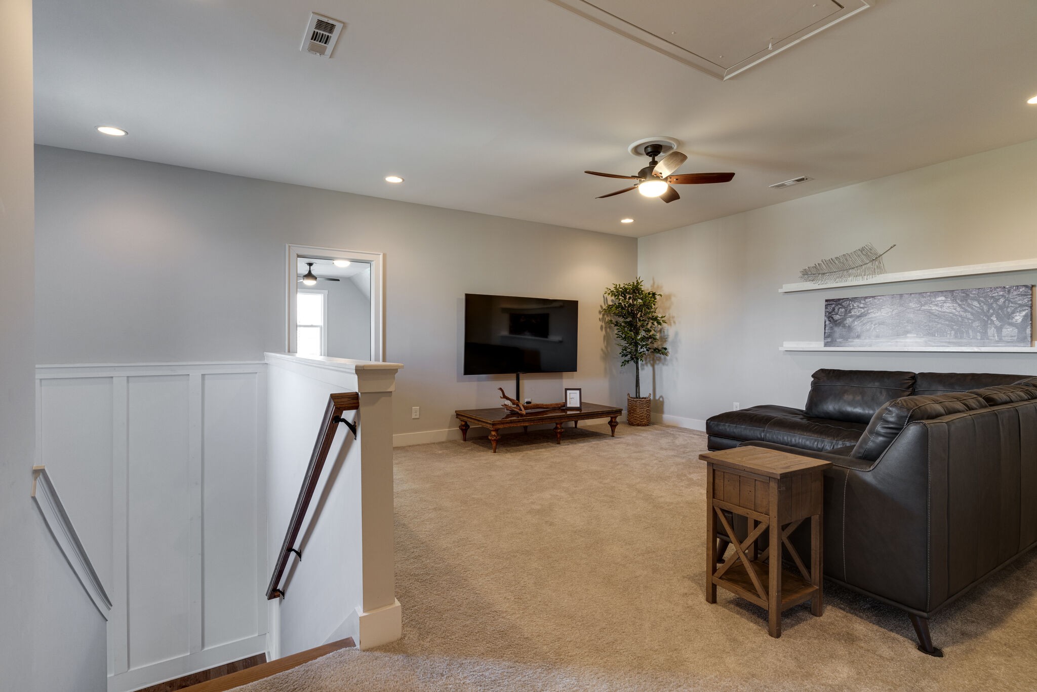 136 Vanner Road Mount Juliet, TN 37122 - Photo 21 of 55 a view of a livingroom with furniture and a flat screen tv