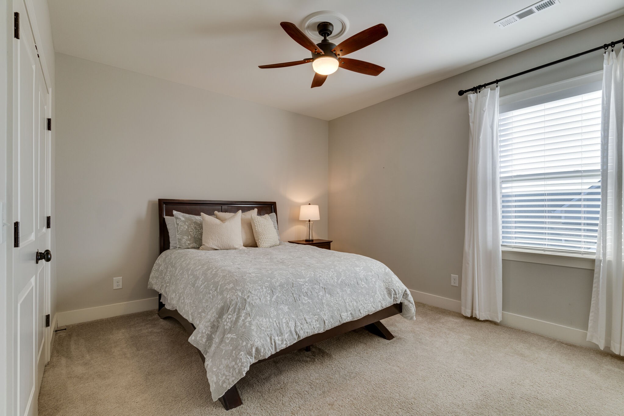 136 Vanner Road Mount Juliet, TN 37122 - Photo 25 of 55 a bedroom with a bed and a ceiling fan