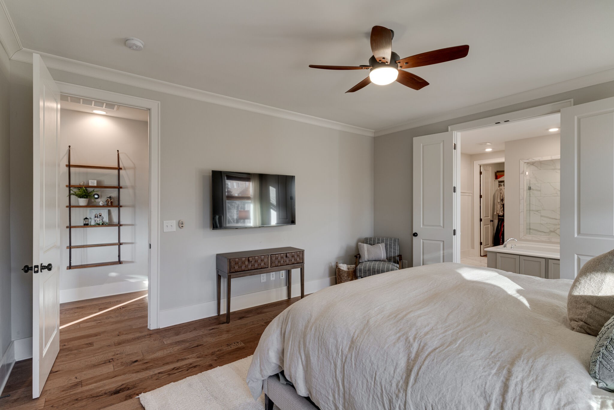 136 Vanner Road Mount Juliet, TN 37122 - Photo 37 of 55 a bedroom with a bed and a large mirror