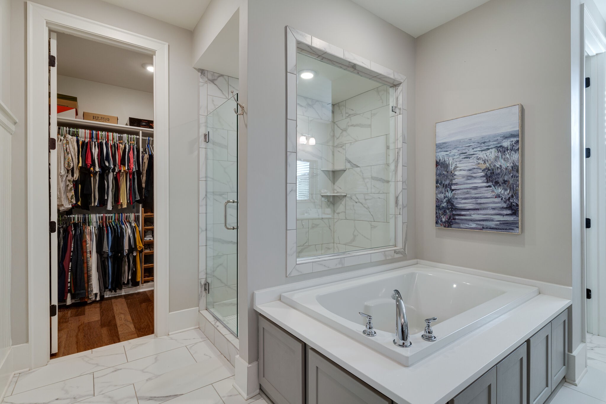 136 Vanner Road Mount Juliet, TN 37122 - Photo 40 of 55 a bathroom with a tub sink and mirror