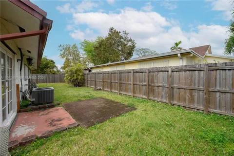 a view of a backyard with a garden