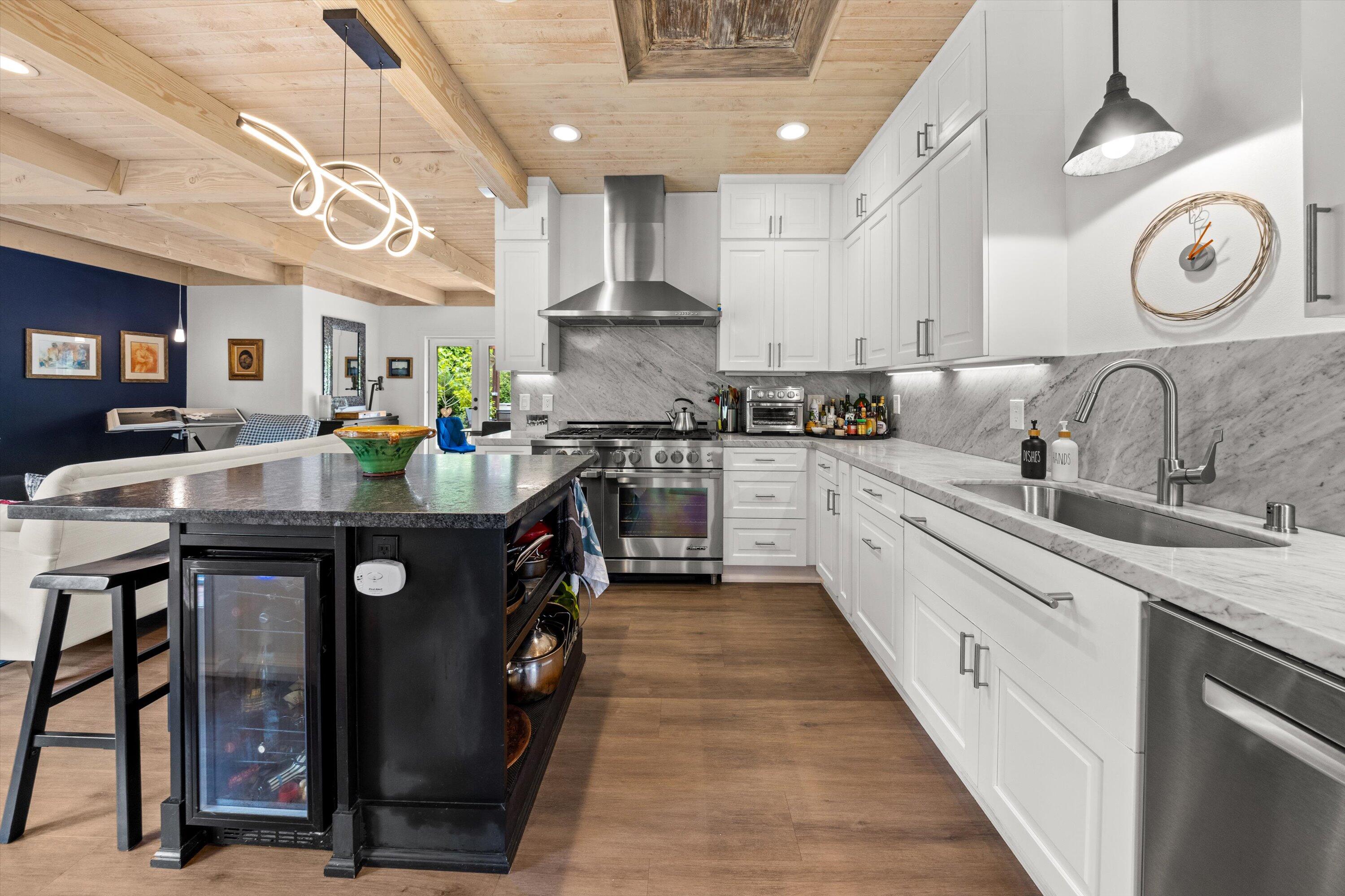 1435 Sycamore Canyon Road Santa Barbara, CA 93108 - Photo 11 of 49 a kitchen with stainless steel appliances granite countertop a sink a stove top oven a counter space and cabinets