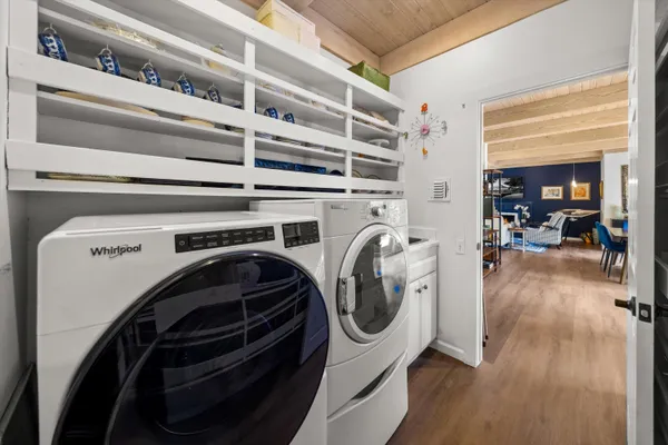 a utility room with dryer and washer