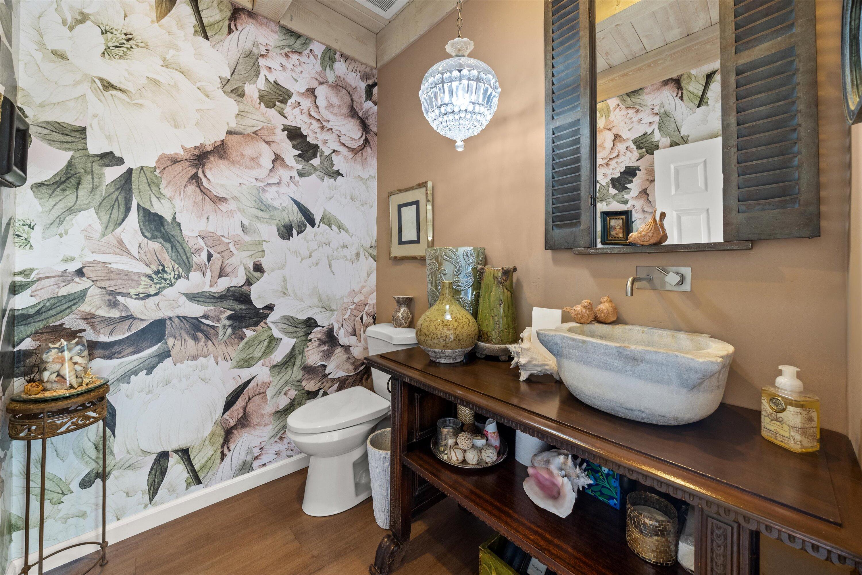 1435 Sycamore Canyon Road Santa Barbara, CA 93108 - Photo 15 of 49 a bathroom with a toilet a sink and a mirror