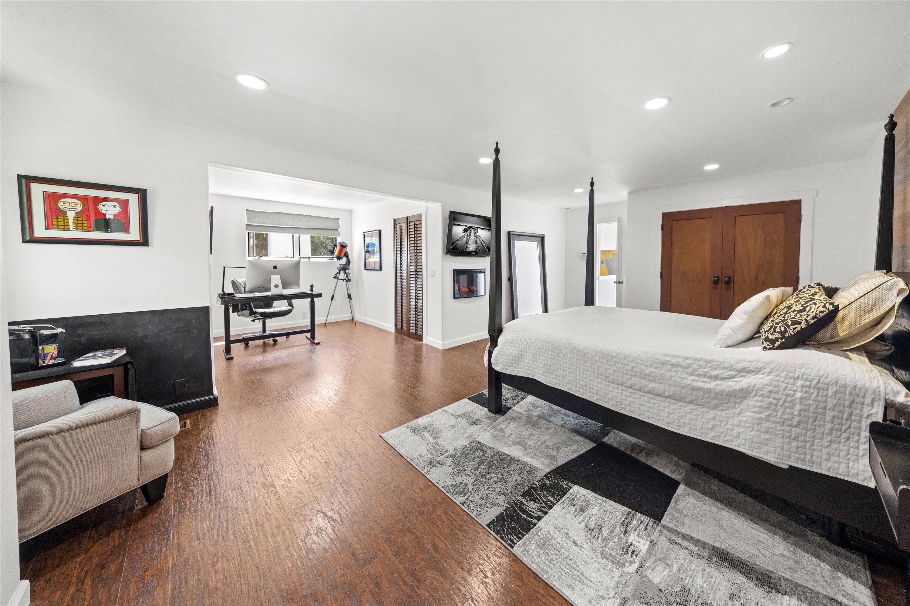 1435 Sycamore Canyon Road Santa Barbara, CA 93108 - Photo 18 of 49 a living room with furniture and wooden floor